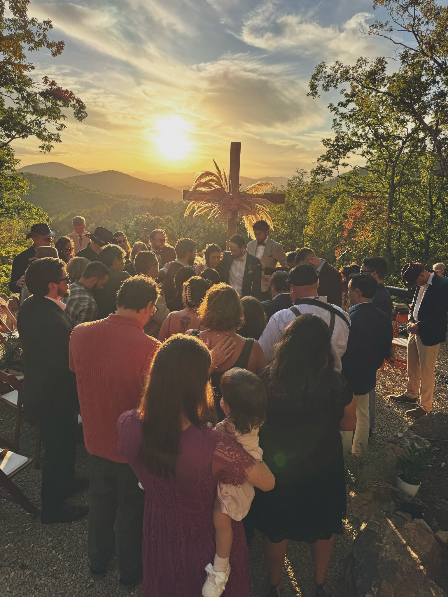 Wedding ceremony with guests gathered at the Blue Ridge ridgeline at Secluded Ridge